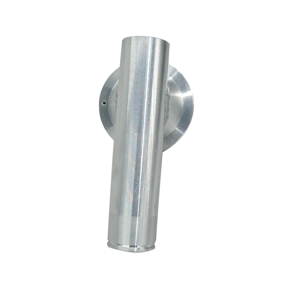 Front view of tube connector showing hex head and threaded opening for pipe fitting