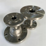 Custom titanium pipe reducer with welded flange connections